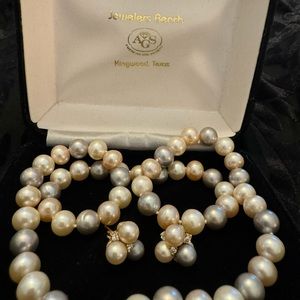 Cultured pearl necklace and earring set.